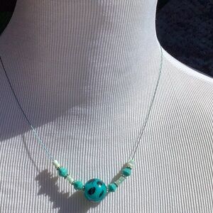 Teal Beaded Necklace with Modern Design